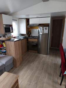 Maisons de vacances Bungalow chaleureux a Saint-Brevin-les-Pins 40 m² piscine partagee : photos des chambres