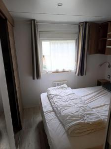 Maisons de vacances Bungalow chaleureux a Saint-Brevin-les-Pins 40 m² piscine partagee : photos des chambres