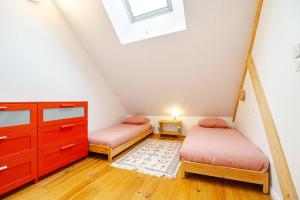 Villas Charmante maison avec piscine : photos des chambres