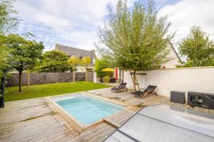 Villas Charmante maison avec piscine : photos des chambres