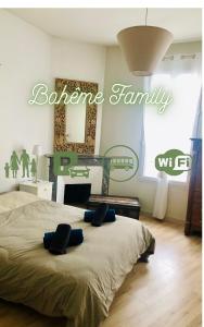 Appartements Maison de ville - cosy - centre ville - wifi -gare : photos des chambres