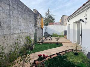 Appartements Maison T2 avec patio : photos des chambres