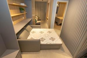 Apartamento próximo a praia com vista lateral do mar