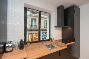 Appartements Pick A Flat's Apartment in Le Marais - Rue Sainte Croix de la Bretonnerie : photos des chambres