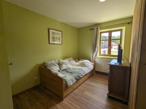 B&B / Chambres d'hotes Chambre familiale climatisee avec acces jardin - FR-1-589-663 : photos des chambres