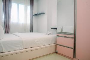 Warm and Minimalist 1BR at Signature Park Grande Apartment By Travelio