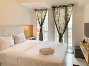 Restful and Cozy Studio Tokyo Riverside PIK 2 Apartment By Travelio