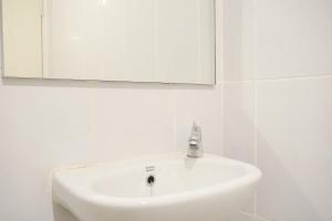 Well Furnished and Homey 2BR Tokyo Riverside PIK 2 Apartment By Travelio