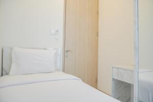 Well Furnished and Homey 2BR Tokyo Riverside PIK 2 Apartment By Travelio