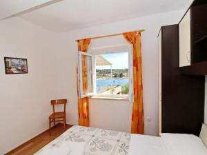 Apartments Radojkovi Lumbarda - Comfort Two Bedroom Apartment with Terrace and Sea View A2