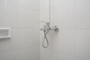 Homey Living Studio at Signature Park Grande Apartment By Travelio