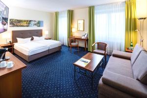 Panorama Studio with Lake View room in AHORN Seehotel Templin