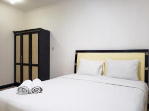 Comfort Living 3BR Apartment with Pool View at Mediterania Palace Residences By Travelio