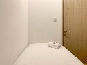 Warm and Cozy Living 2BR Tokyo Riverside PIK 2 Apartment By Travelio