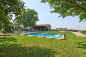 La Cabaña piscina y jardín - San Sebastián de los Ballesteros