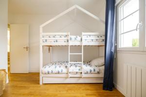 Villas Maison de famille avec piscine : photos des chambres