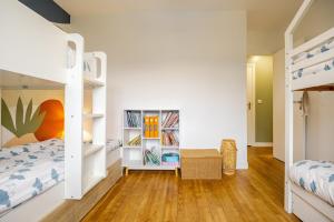 Villas Maison de famille avec piscine : photos des chambres