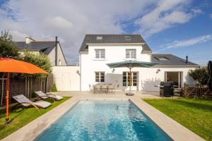 Villas Maison de famille avec piscine : photos des chambres
