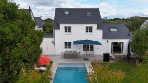 Villas Maison de famille avec piscine : photos des chambres