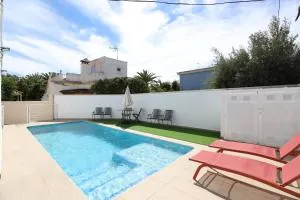 2 apartamentos en una excelente villa de playa compartiendo Piscina y Jardín - Sagunto