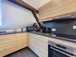 Appartements Le NID DE CIGOGNE - Calme - Neuf - CLIMATISATION - Haut de gamme - Dernier etage : photos des chambres
