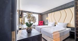 Comfort Quadruple Room room in PLAZA Hotel Bruchsal