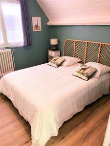 Maisons de vacances Le Jardin d'Ana et La Maison d'Elena 15km du Zoo : photos des chambres