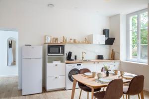 Appartements Le logis de Chambord : photos des chambres