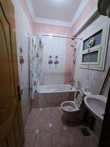 2-bedrooms Apartment with quiet sitting area in front of it