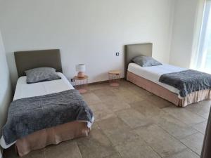 Maisons de vacances Villa avec vue panoramique mer et montagne : photos des chambres