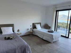 Maisons de vacances Villa avec vue panoramique mer et montagne : photos des chambres