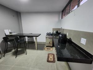 Suíte Privativa Climatizada Mobiliada com Garagem e Wi-Fi 3