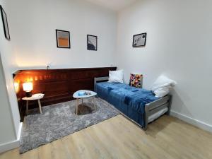 Appartements Appartement La Pause Bleue : photos des chambres