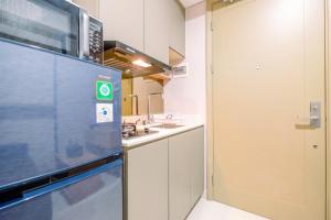 Comfort and Modern 1BR at Gold Coast Apartment By Travelio