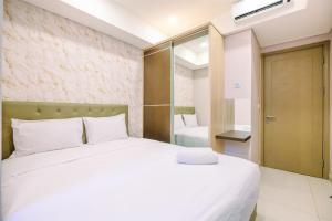 Comfortable 1BR at Gold Coast Apartment By Travelio