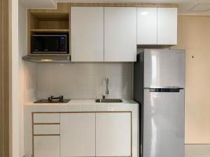 Comfortable and Spacious 1BR Tokyo Riverside PIK 2 Apartment By Travelio