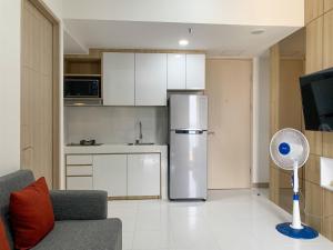 Comfortable and Spacious 1BR Tokyo Riverside PIK 2 Apartment By Travelio