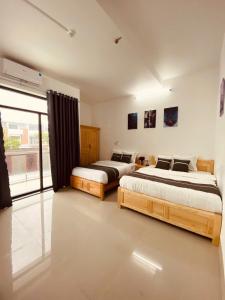 Phòng 4 Người Có Ban Công (Quadruple Room with Balcony)