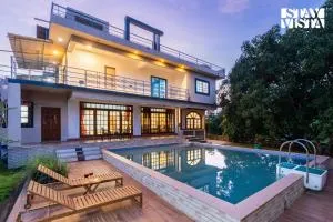 StayVista at FarmVille with Mountain View, Pool - Alibag