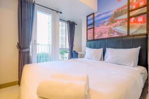 Homey and Relaxing Studio Tokyo Riverside PIK 2 Apartment By Travelio