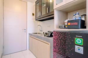 Homey and Relaxing Studio Tokyo Riverside PIK 2 Apartment By Travelio