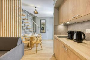 Appartements The Duplex spa Paris : photos des chambres