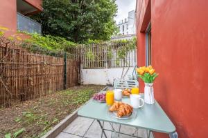 Superbe appartement 1min métro7 Rez-de-chaussée