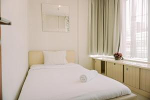 Elegant and Strategic 2BR Apartment at Thamrin Residence By Travelio
