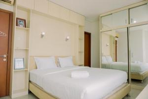 Elegant and Strategic 2BR Apartment at Thamrin Residence By Travelio