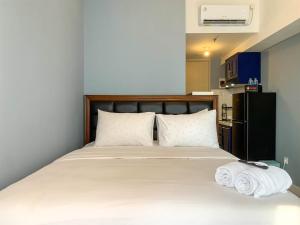 Cozy Studio at 31th Floor Tokyo Riverside PIK 2 Apartment By Travelio