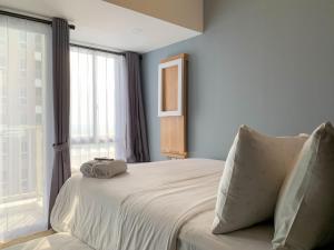 Cozy Studio at 31th Floor Tokyo Riverside PIK 2 Apartment By Travelio