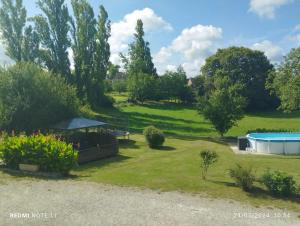 Maisons de vacances Maison charmante avec piscine a Loupiac : photos des chambres