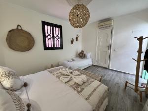 RIAD RIME QOUSSAI