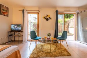 Superbe appartement 1min métro7 Rez-de-chaussée